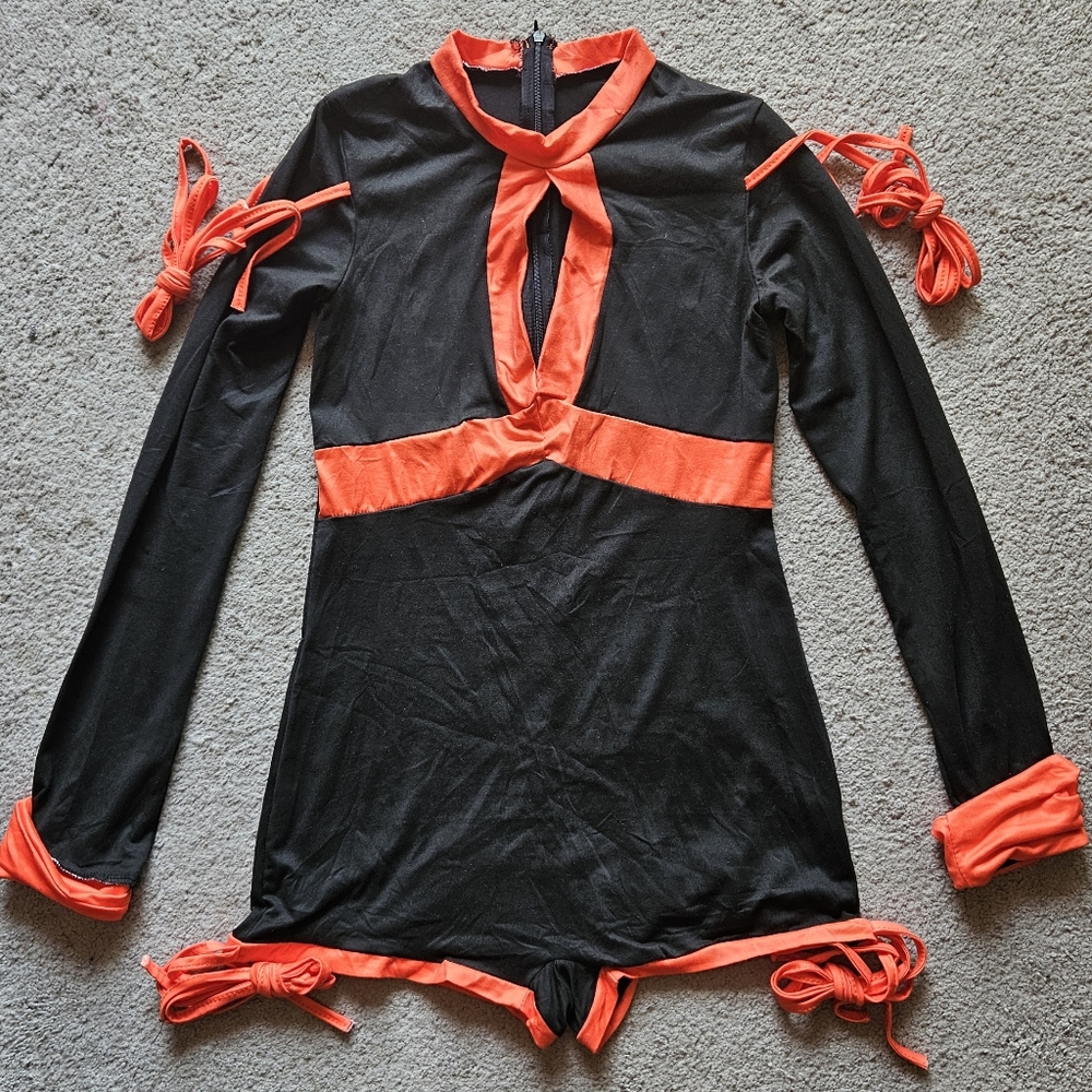 Black/orange sexy ninja Halloween costume. Medium. New without tags.